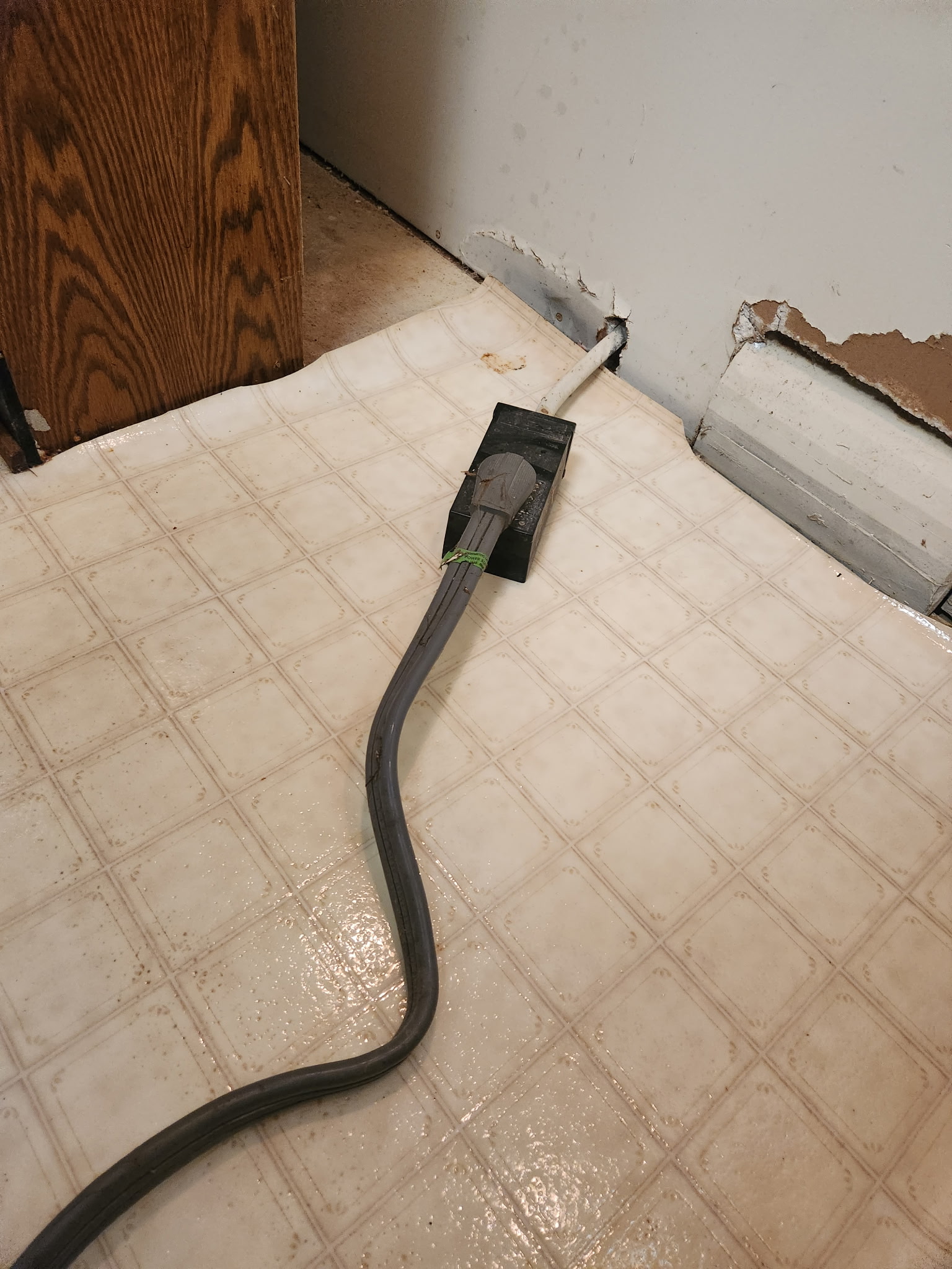 Floor behind stove after focused kitchen cleaning